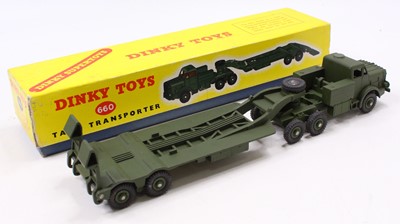 Lot 1438 - A Dinky Toys No. 660 military tank transporter...
