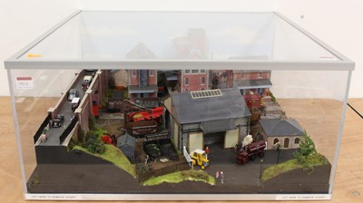 Lot 350A - A 00 gauge industrial scene plastic and cased...