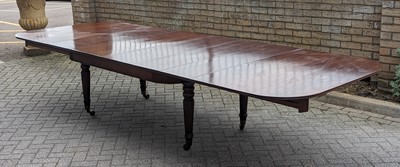 Lot 2499 - A 19th century mahogany extending dining table...