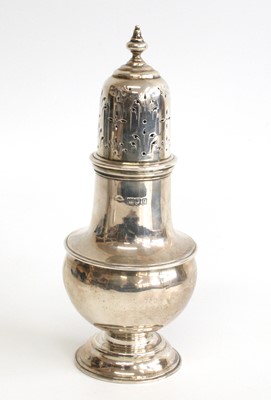 Lot 2187 - A George V silver lighthouse sugar caster, the...