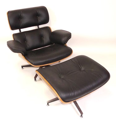 Lot 407 - After Charles & Ray Eames - a lounge chair and...