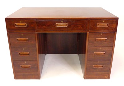 Lot 382 - A 1970s Danish rosewood kneehole writing desk,...