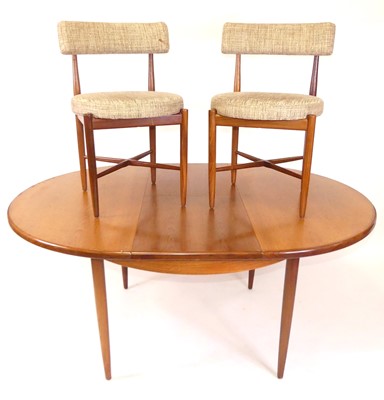 Lot 365 - A 1960s G-Plan 'Fresco' teak dining suite,...