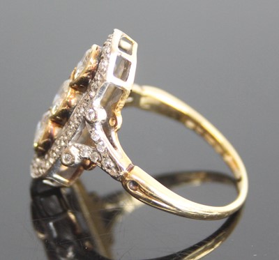 Lot 2568 - An 18ct yellow and white gold Art Deco style...