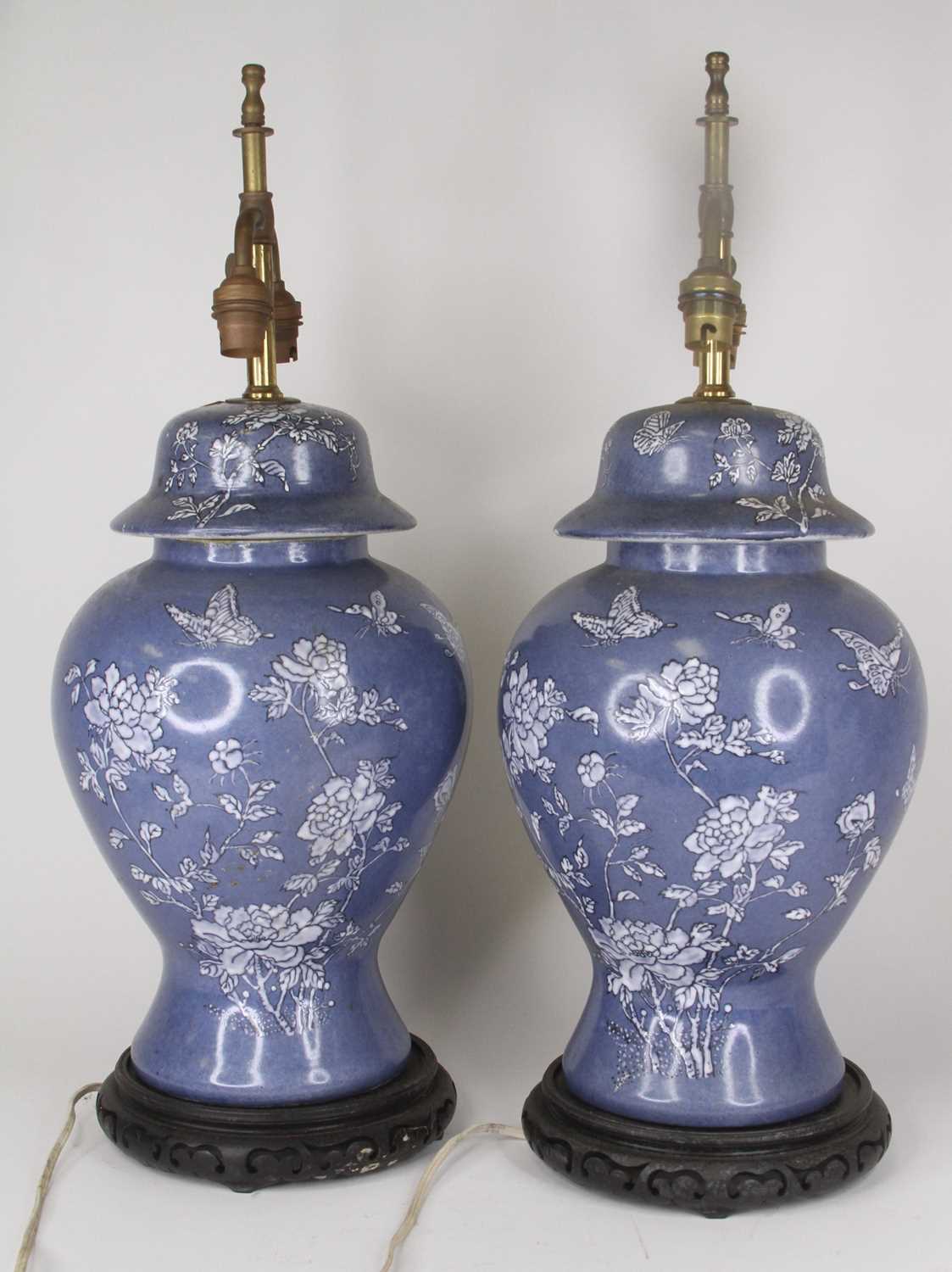 Lot 19 - A pair of Chinese table lamps, each in the...