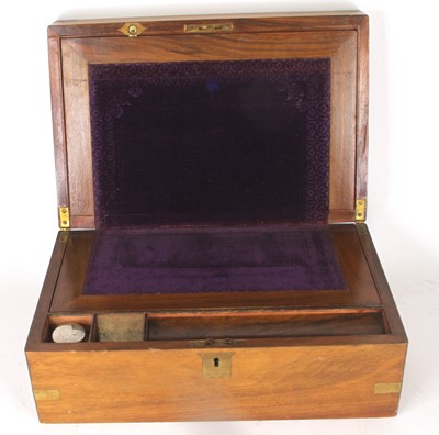 Lot 30 - A Victorian walnut writing slope, of typical...