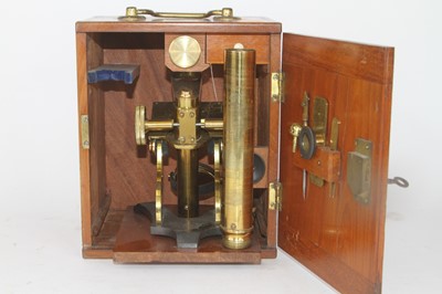 Lot 44 - A 19th century lacquered monocular microscope,...