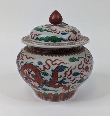 Lot 60 - A Chinese porcelain jar and cover, of squat...