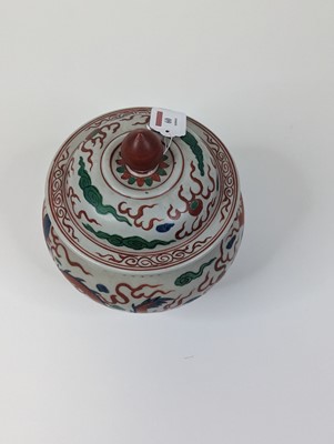 Lot 60 - A Chinese porcelain jar and cover, of squat...