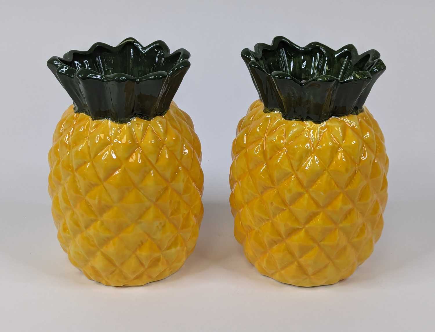 Lot 67 - A pair of novelty vases modelled as pineapples,...