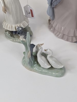 Lot 71 - A Lladro porcelain figure of a lady, shown...