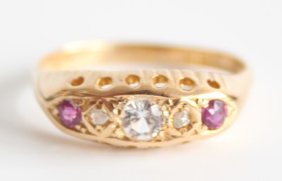 Lot 2596 - An 18ct yellow gold ruby half hoop eternity...