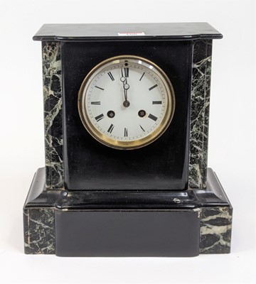Lot 108 - A Victorian black slate mantel clock, having...
