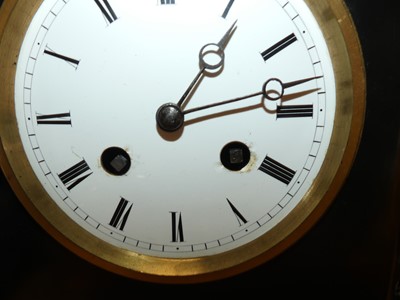 Lot 108 - A Victorian black slate mantel clock, having...
