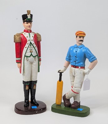 Lot 116 - A painted cast iron model of a soldier, h.40cm;...