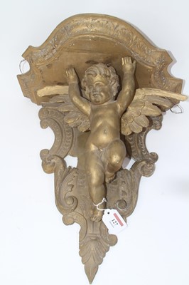 Lot 127 - A carved pine and later gilt painted wall...