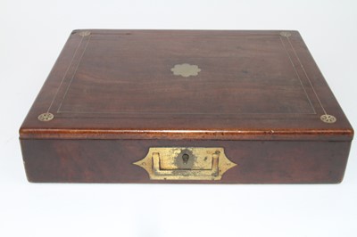 Lot 131 - A mid-19th century mahogany and brass inlaid...
