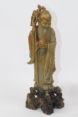 Lot 139 - A Chinese hardstone carving of a scholar,...