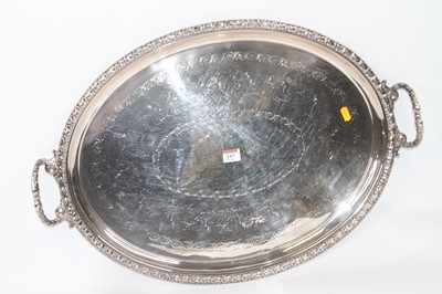 Lot 143 - A silver plated twin handled tray, of oval...