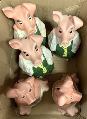 Lot 195 - Three Wade pottery piggy-banks, together with...