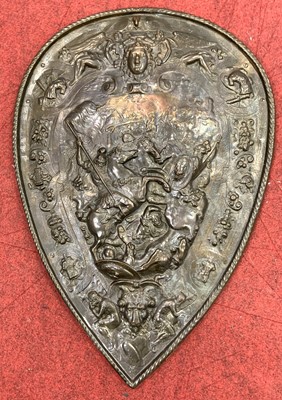 Lot 198 - An embossed copper shield, with high-relief...