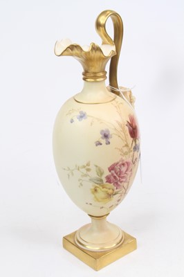 Lot 210 - A Royal Worcester blush ivory ewer, decorated...