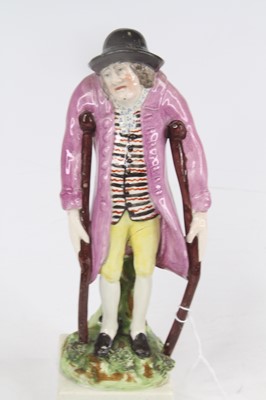 Lot 236 - A 19th century Staffordshire pearlware figure...