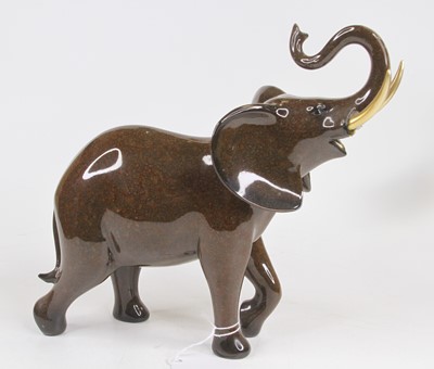 Lot 245 - An Aynsley brown glazed model of an elephant,...