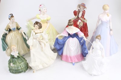 Lot 252 - A collection of eight Royal Doulton figures of...