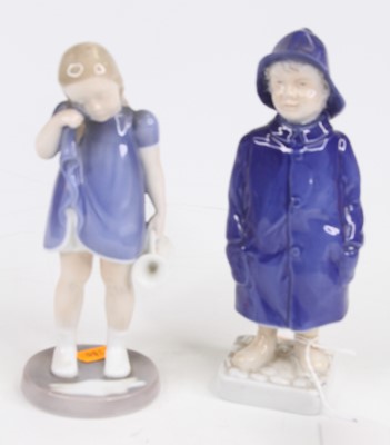 Lot 260 - Two Bing & Grondahl figures being of a boy and...