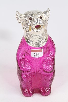 Lot 294 - A pink glass and plated metal decanter, in the...