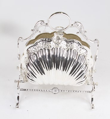 Lot 296 - A modern plated metal shell shaped biscuit box,...