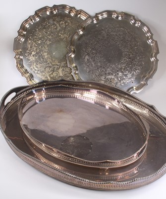 Lot 306 - A graduated set of two silver plated trays,...