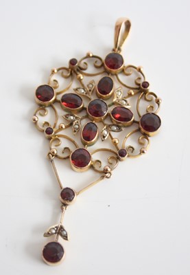 Lot 2598 - A yellow metal Edwardian openwork garnet and...