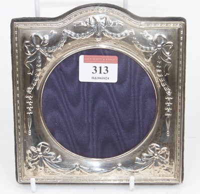 Lot 313 - An Elizabeth II silver clad photograph frame,...