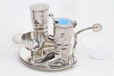 Lot 340 - A novelty plated metal table cruet set in the...