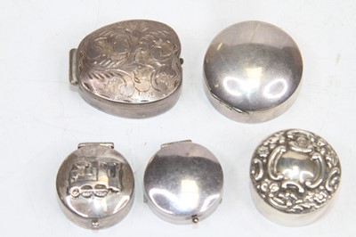 Lot 345 - A collection of five silver and white metal...