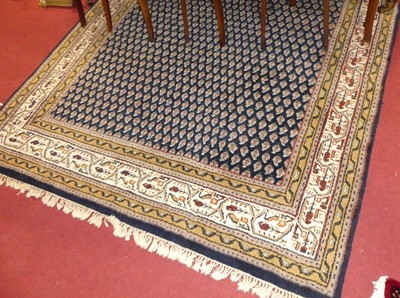 Lot 1186 - A Persian woollen blue ground Bokhara rug, the...