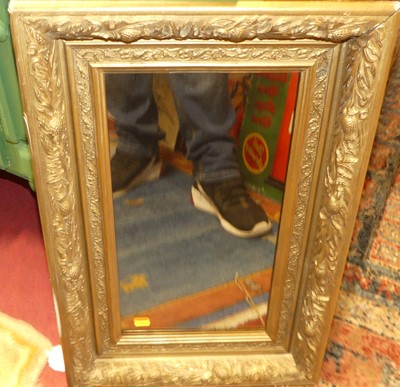 Lot 1145 - A gilt framed and bevelled rectangular wall...