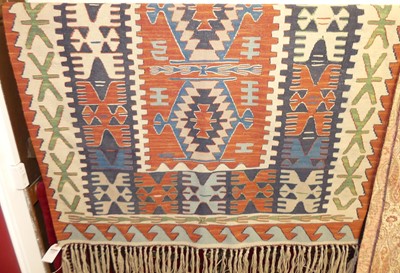 Lot 1191 - A Turkish woollen multi coloured ground kelim...