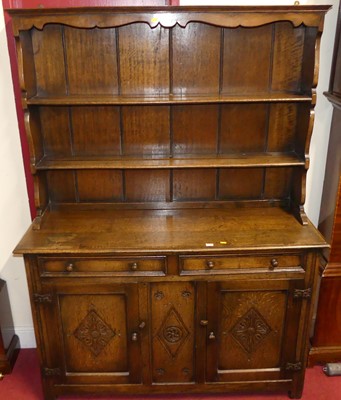 Lot 1209 - A contemporary joined oak dresser, in the 18th...