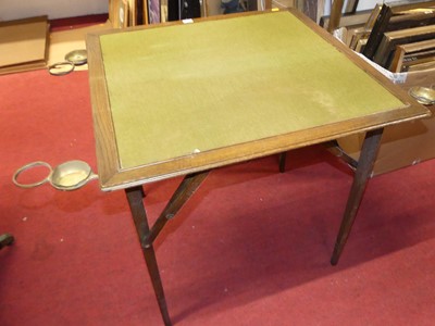 Lot 1223 - A 1930s oak campaign travelling card table, 72...