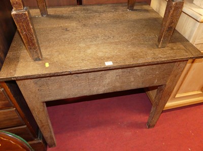 Lot 1234 - A late 19th century oak hinge top clerk's desk,...