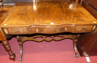 Lot 1242 - A flame mahogany and cross banded sofa table,...