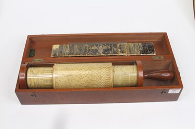 Lot 606 - A vintage Fuller spiral slide rule, housed in...