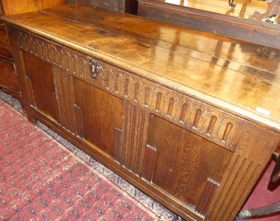 Lot 1260 - An 18th century joined oak three panelled...