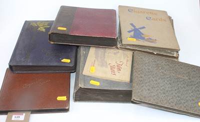 Lot 648 - A collection of cigarette card albums, to...