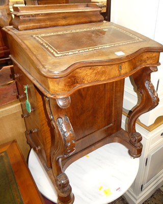 Lot 1285 - A mid-Victorian walnut slope front Davenport,...