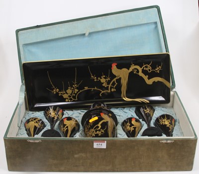 Lot 654 - A 20th century gilt and lacquered six-place...