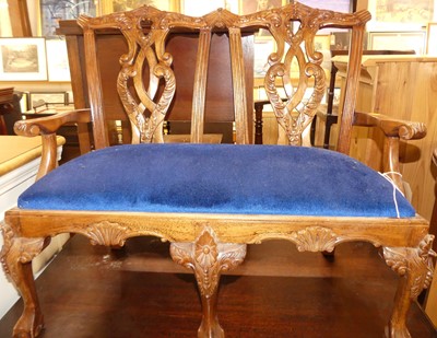 Lot 1288 - A carved floral hardwood child's two seat...